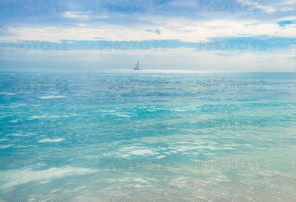 Sailboat over calm sea