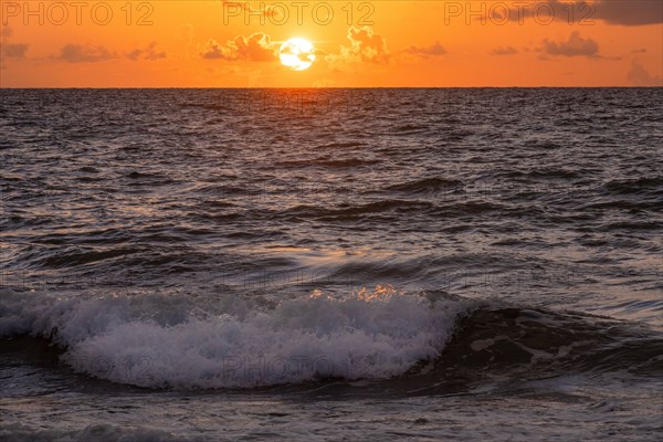 Ocean waves at sunrise