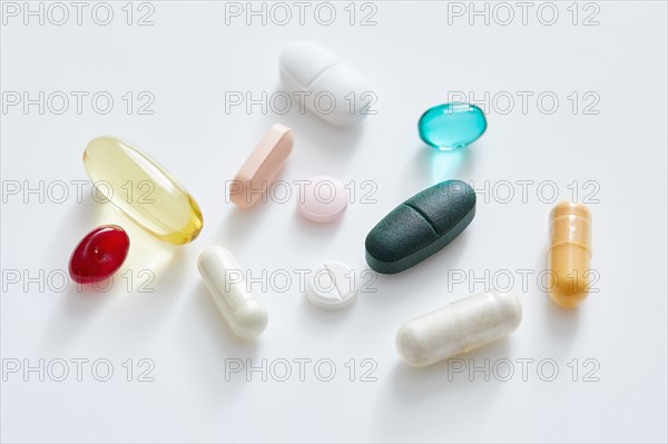 Studio shot of assorted pills and vitamins