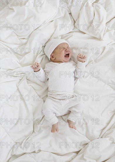 Overhead view of newborn boy