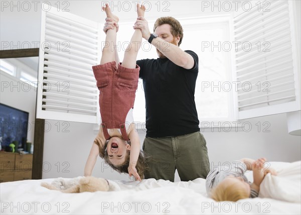 Father playing with daughter