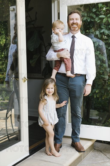 Portrait of smiling father with son