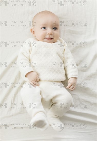 Overhead view of smiling baby boy