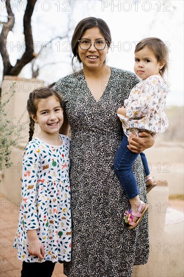 Portrait of mother with two daughters