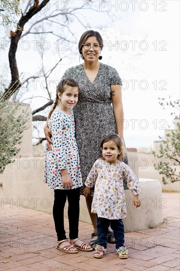 Portrait of mother with two daughters