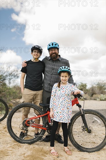 Portrait of father with children