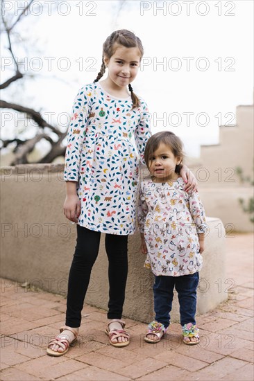 Portrait of smiling sisters