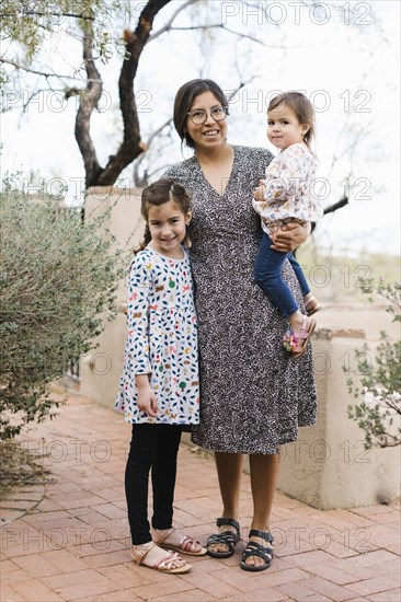 Portrait of mother with two daughters