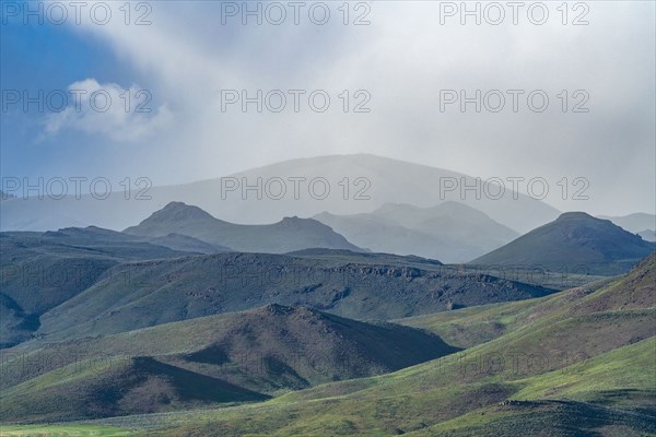 Clouds over foothills