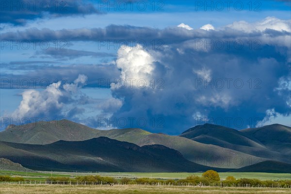 Clouds over foothills