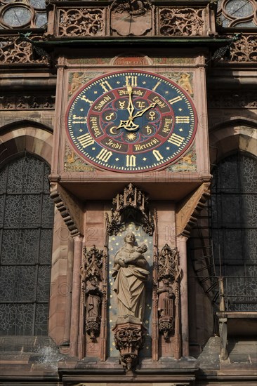 Clock on facade of Cathedral de Notre Dame of Strasbourg