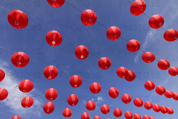 Chinese lanterns against blue sky