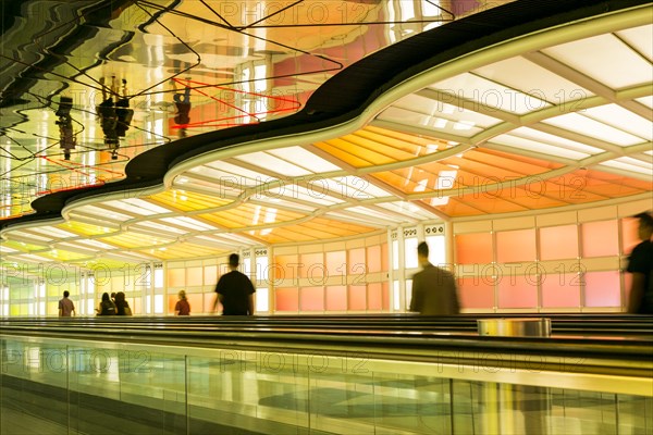 Airport corridor illuminated at night