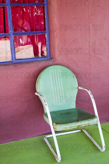 Retro metal chair on porch