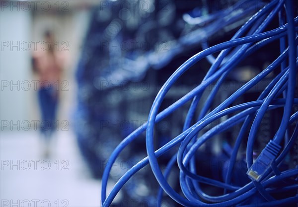 Close-up of blue cables in server room