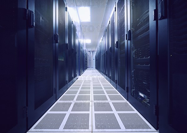 Rows of server racks in data center