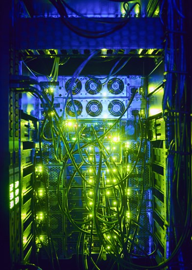 Illuminated network cables in server room