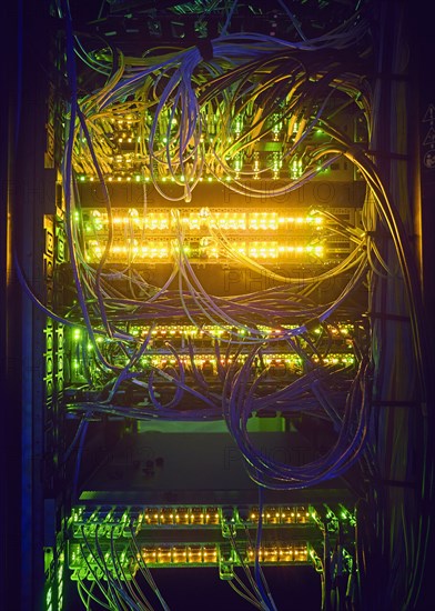 Illuminated network cables in server room