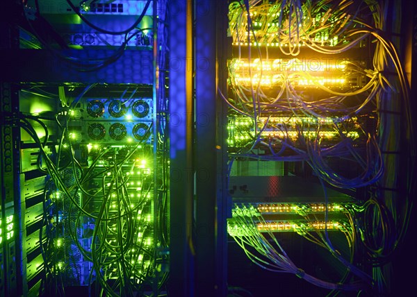 Illuminated network cables in server room