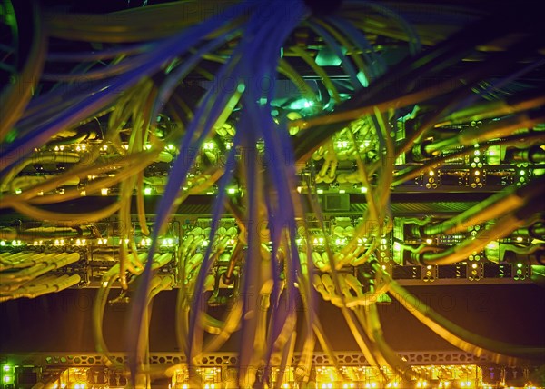 Illuminated network cables in server room