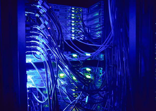 Illuminated network cables in server room