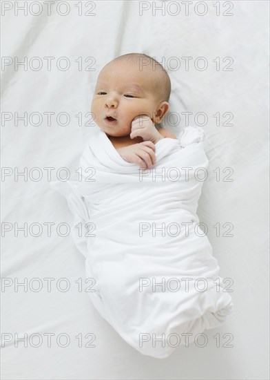 Overhead view of newborn baby boy