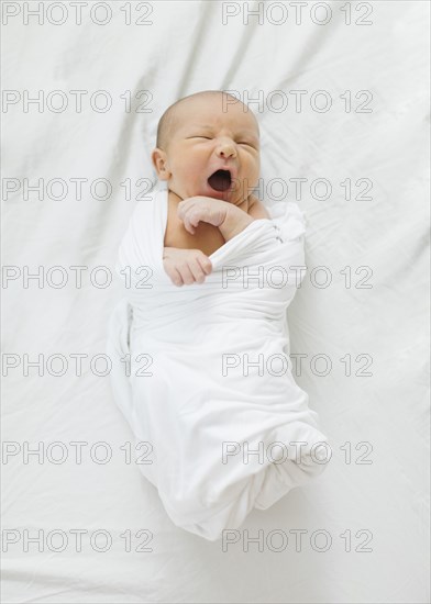 Overhead view of newborn baby boy