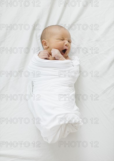 Overhead view of newborn baby boy