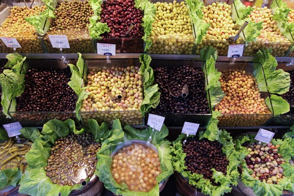 Variety of olives at market