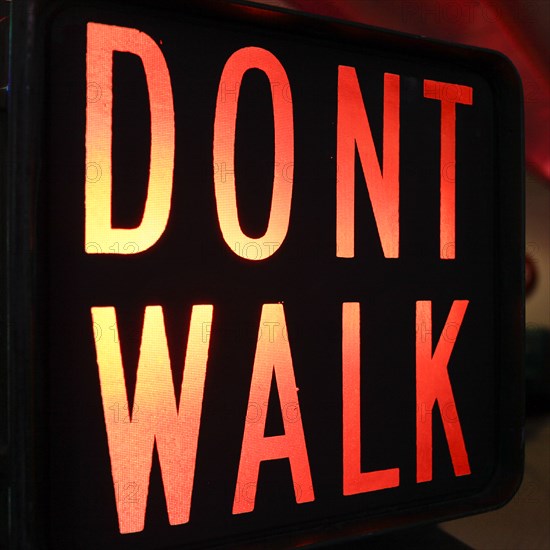 Close-up of illuminated traffic sign