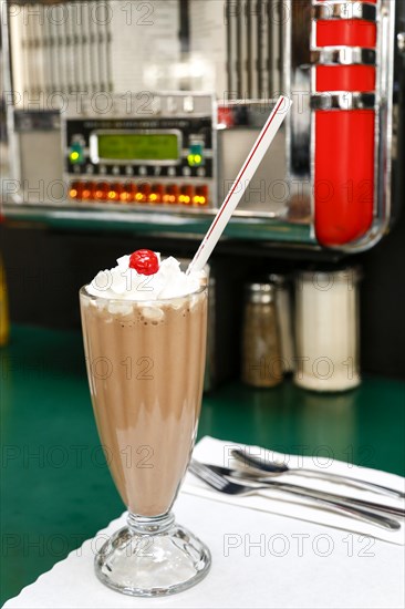 Chocolate milkshake on diner table