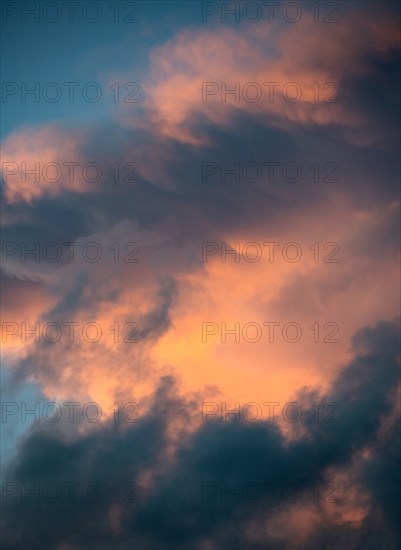 Dramatic storm clouds at sunset