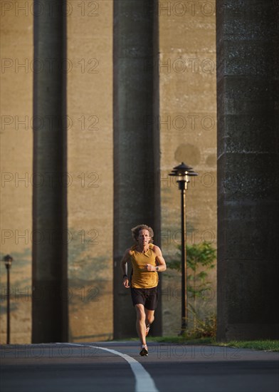 Man jogging on road