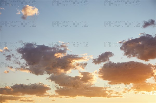 Clouds on blue sky at sunset