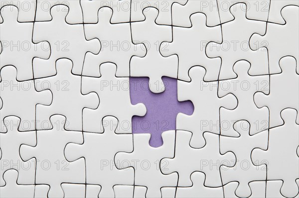 Piece missing from white jigsaw puzzle