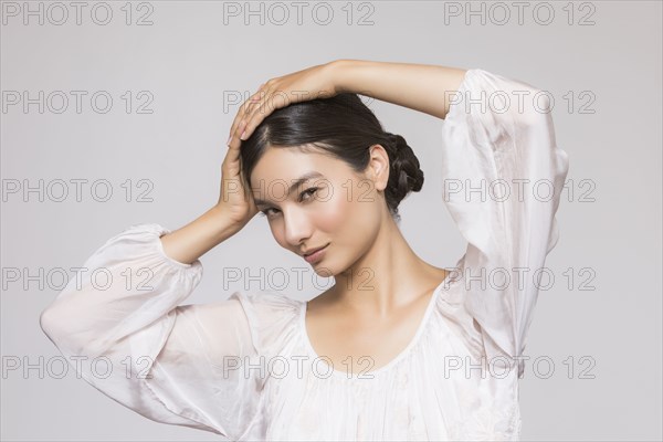 Studio portrait of beautiful woman