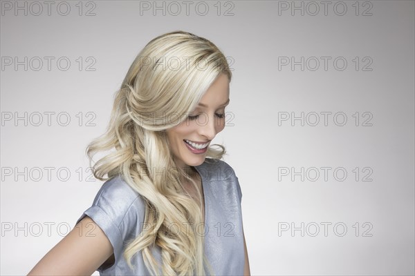 Studio portrait of beautiful blond woman