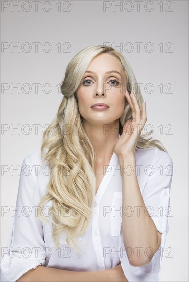 Studio portrait of beautiful blond woman