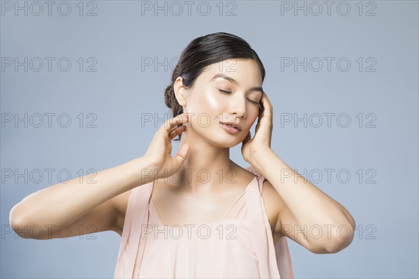 Studio portrait of beautiful woman