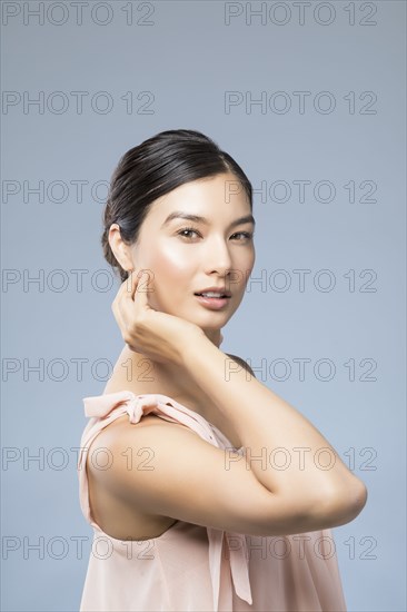 Studio portrait of beautiful woman