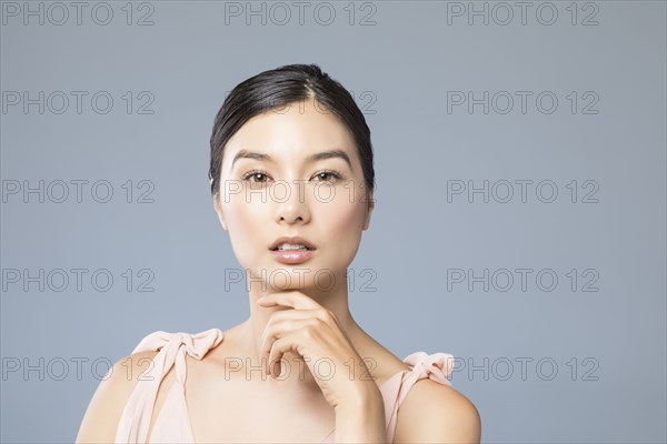 Studio portrait of beautiful woman