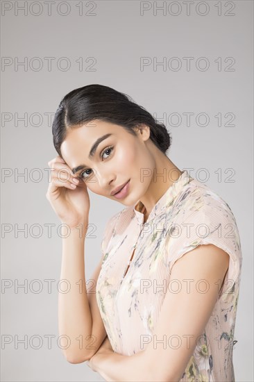 Studio portrait of beautiful woman