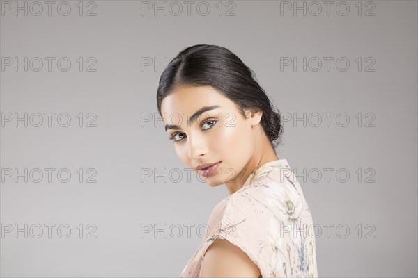 Studio portrait of beautiful woman