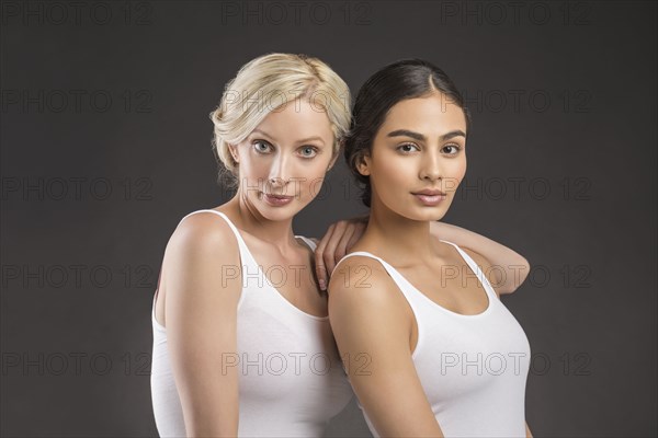 Studio portrait of two beautiful women