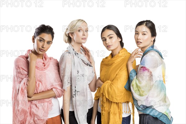 Studio portrait of four beautiful women