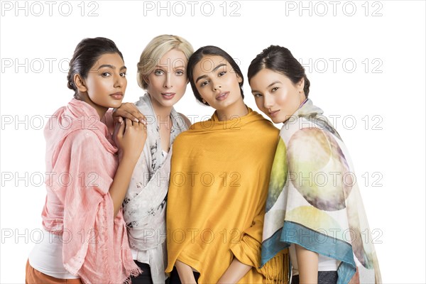 Studio portrait of four beautiful women