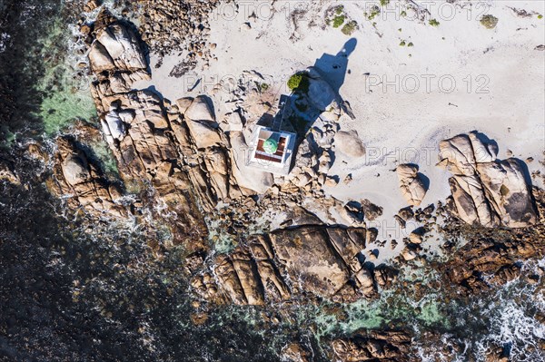 Aerial view of lighthouse on sea coast