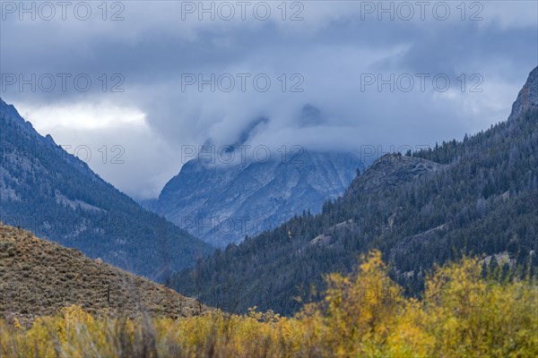 Mountains in clouds at fall