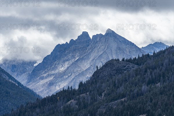 Overcast sky over scenic mountains