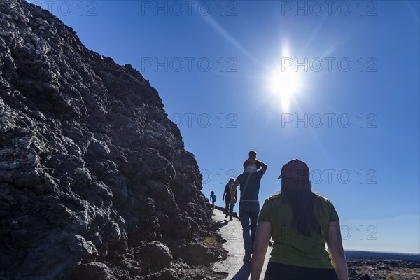 Family visits Craters of Moon National Monument